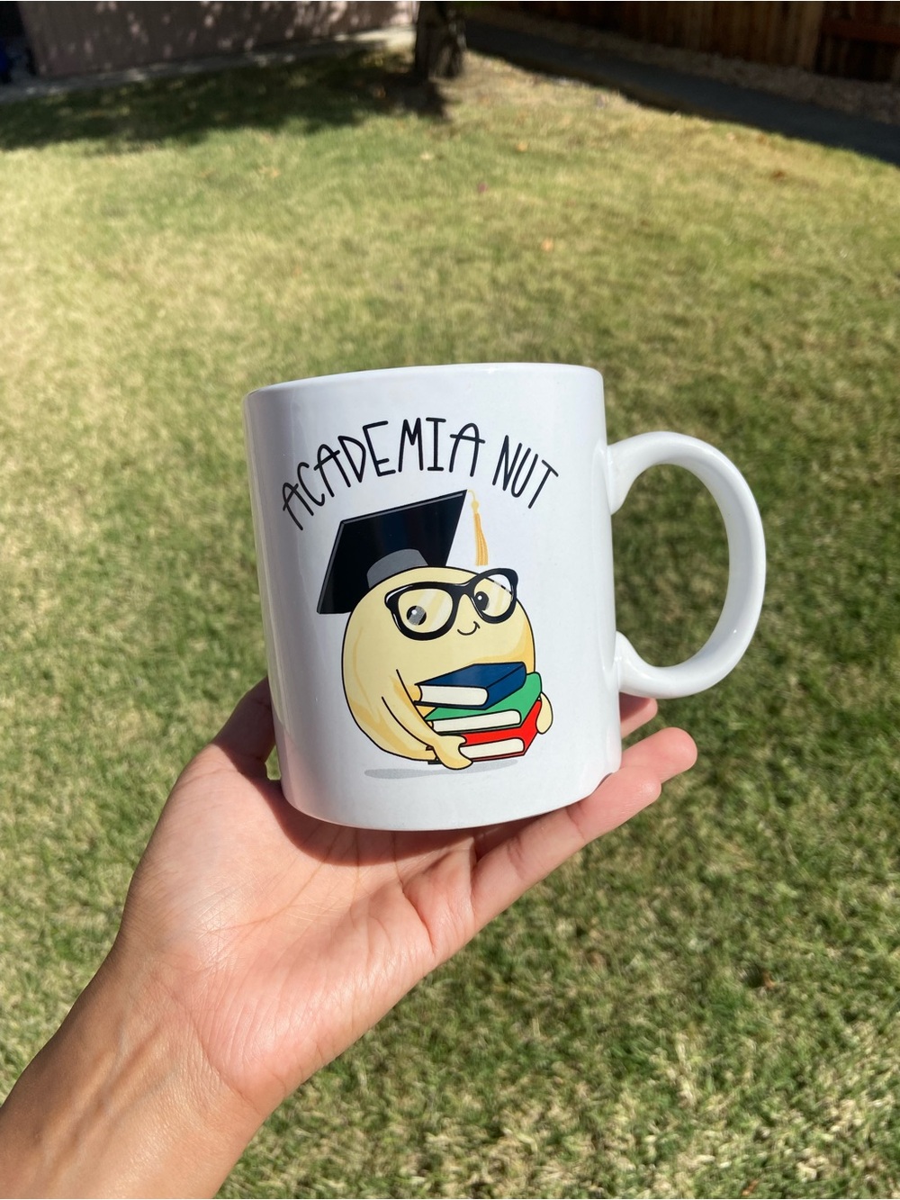 Academia Nut White Ceramic Mug with Graduation Design